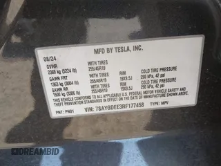 2024 Tesla Model Y Long Range with VIN 7SAYGDEE3RF177458, listed as a IAAI auction lot 42109641 with 7,890 mi miles. Bid and sale history available at carsss.com. Image 9.