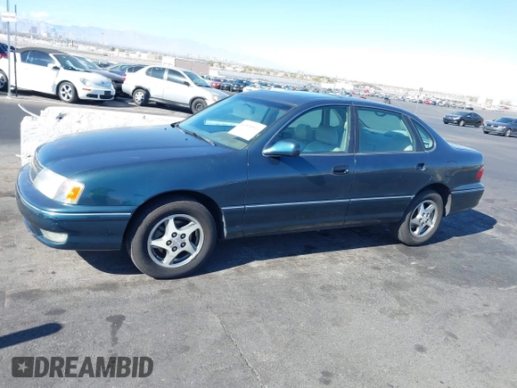 1998 Toyota Avalon XL with VIN 4T1BF18BXWU267131, listed as a IAAI auction lot 41518513 with 208,023 mi miles and . Bid and sale history available at DreamBid. Image 14.