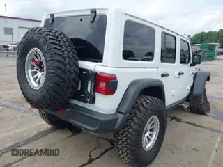 2021 Jeep Wrangler Unlimited Rubicon with VIN 1C4HJXFG7MW527498, listed as a IAAI auction lot 42393520 with 18,085 mi miles and . Bid and sale history available at DreamBid. Image 4.