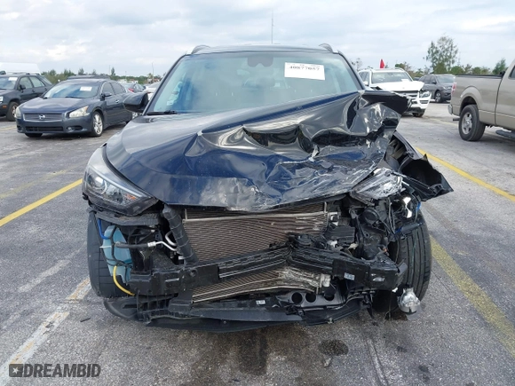 2019 Hyundai Tucson Value with VIN KM8J33A40KU068014, listed as a IAAI auction lot 40877057 with 34,966 mi miles. Bid and sale history available at carsss.com. Image 12.
