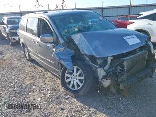 2014 Chrysler Town & Country Touring z VIN 2C4RC1BG4ER158739, wystawiony jako IAAI lot #40970547 z przebiegiem 179 456 mil mil oraz . Historia ofert i sprzedaży dostępna na DreamBid. Obrazek 1.