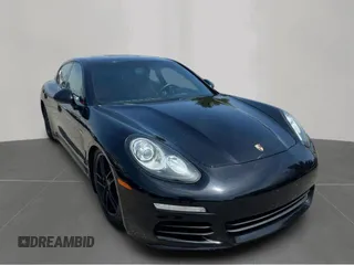 2016 Porsche Panamera 4 z VIN WP0AA2A71GL000493, wystawiony jako Copart lot #57187295 z przebiegiem 84 384 mil mil oraz Czysty tytuł • Clean title. Historia ofert i sprzedaży dostępna na DreamBid. Obrazek 1.