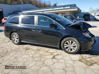2014 Honda Odyssey EX-L with VIN 5FNRL5H69EB121140, listed as a Copart auction lot 79698724 with 169,626 mi miles and Salvage Title. Bid and sale history available at DreamBid. Image 4.