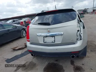 2014 Cadillac SRX Luxury Collection z VIN 3GYFNBE31ES628346, wystawiony jako IAAI lot #41709425 z przebiegiem 47 634 mil mil oraz . Historia ofert i sprzedaży dostępna na DreamBid. Obrazek 16.