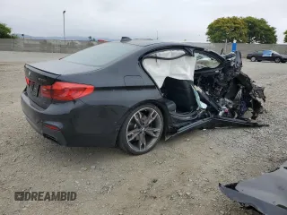 2019 BMW 5 Series M550i xDrive with VIN WBAJB9C53KB464298, listed as a Copart auction lot 59892105 with Not provided miles and Salvage title. Bid and sale history available at DreamBid. Image 3.