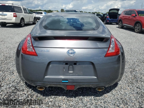 2014 Nissan 370Z with VIN JN1AZ4EH6EM633797, listed as a Copart auction lot 74027354 with Not Provided miles and Salvage Title. Bid and sale history available at DreamBid. Image 6.
