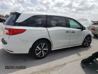 2020 Honda Odyssey Elite with VIN 5FNRL6H95LB012171, listed as a Copart auction lot 48786695 with 133,604 mi miles and Salvage Title. Bid and sale history available at DreamBid. Image 3.