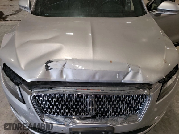 2019 Lincoln MKC Reserve with VIN 5LMCJ3D93KUL22446, listed as a Copart auction lot 86144824 with 64,269 mi miles and Salvage Title. Bid and sale history available at DreamBid. Image 12.