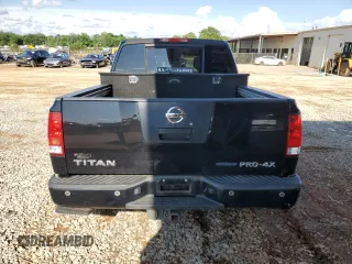 2012 Nissan Titan SV with VIN 1N6BA0EC6CN312465, listed as a Copart auction lot 58722815 with 186,207 mi miles and Salvage title. Bid and sale history available at DreamBid. Image 6.