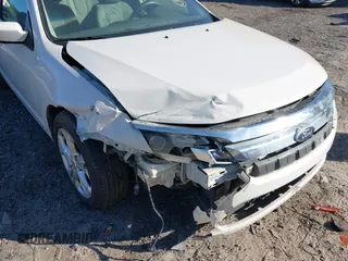 2012 Ford Fusion SE with VIN 3FAHP0HA9CR402640, listed as a IAAI auction lot 42052610 with 210,441 mi miles and . Bid and sale history available at carsss.com. Image 6.