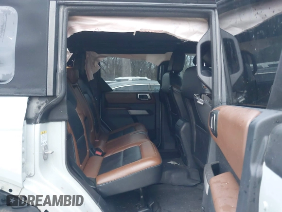 2023 Ford Bronco z VIN 1FMEE5DP3PLB33884, wystawiony jako IAAI lot #41202669 z przebiegiem 58 749 mil mil oraz . Historia ofert i sprzedaży dostępna na DreamBid. Obrazek 8.