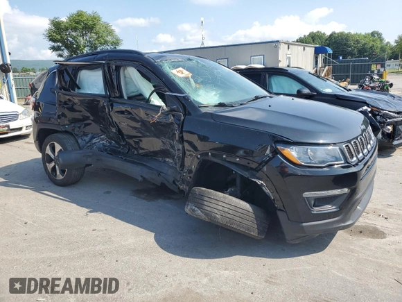 2019 Jeep Compass Latitude z VIN 3C4NJDBB5KT713992, wystawiony jako Copart lot #64503495 z przebiegiem 99 097 mil mil oraz Szkoda całkowita • Salvage title. Historia ofert i sprzedaży dostępna na DreamBid. Obrazek 4.