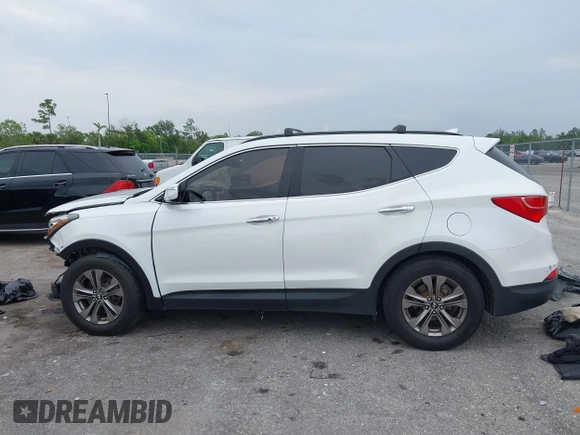 2014 Hyundai Santa Fe with VIN 5XYZU3LB9EG229255, listed as a IAAI auction lot 42407410 with 201,523 mi miles and . Bid and sale history available at DreamBid. Image 15.