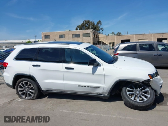 2018 Jeep Grand Cherokee Limited with VIN 1C4RJFBG3JC245943, listed as a IAAI auction lot 42287279 with 107,719 mi miles and . Bid and sale history available at DreamBid. Image 13.