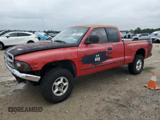 1997 Dodge Dakota z VIN 1B7GG23Y8VS260794, wystawiony jako Copart lot #87089194 z przebiegiem 282 453 mil mil oraz Szkoda całkowita • Salvage title. Historia ofert i sprzedaży dostępna na DreamBid. Obrazek 1.