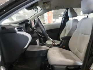 2023 Toyota Corolla Cross L with VIN 7MUAAABG8PV049431, listed as a Copart auction lot 56982055 with 20,275 mi miles and Salvage title. Bid and sale history available at DreamBid. Image 7.
