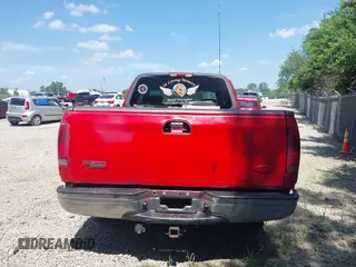2002 Ford F-150 XL z VIN 1FTRX17212KB77969, wystawiony jako IAAI lot #42554893 z przebiegiem Nie podano mil oraz . Historia ofert i sprzedaży dostępna na DreamBid. Obrazek 16.