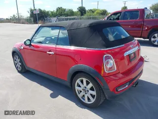 2011 MINI Cooper Convertible s with VIN WMWZP3C55BT249405, listed as a IAAI auction lot 41461640 with 59,856 mi miles. Bid and sale history available at carsss.com. Image 3.