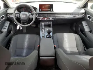 2024 Honda Civic LX с VIN 19XFL2H52RE023572, выставлен на аукционе Copart как лот 55791845 с пробегом 12 632 миль миль и Списание • Salvage title. История ставок и продаж доступна на DreamBid. Изображение 8.