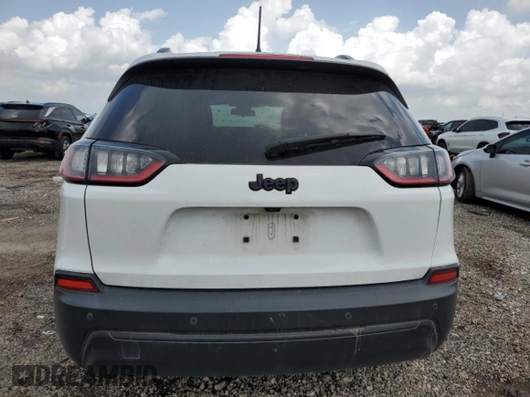 2020 Jeep Cherokee Latitude Plus with VIN 1C4PJLLBXLD561068, listed as a Copart auction lot 53815785 with 179,449 mi miles and Salvage title. Bid and sale history available at DreamBid. Image 6.