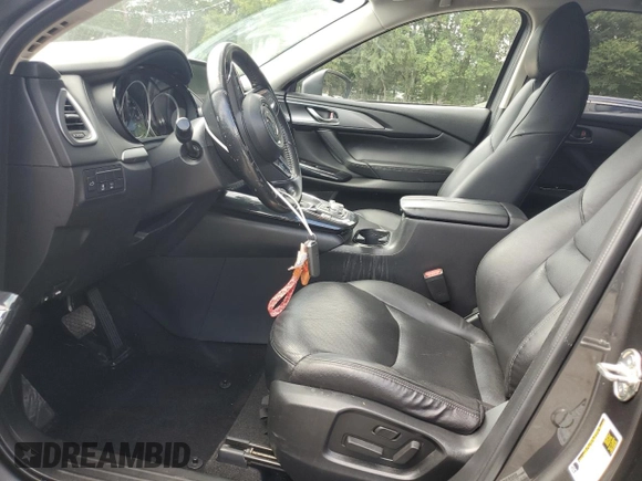 2019 Mazda CX-9 Touring with VIN JM3TCACY6K0334121, listed as a Copart auction lot 64901735 with 112,328 mi miles and Salvage title. Bid and sale history available at DreamBid. Image 7.