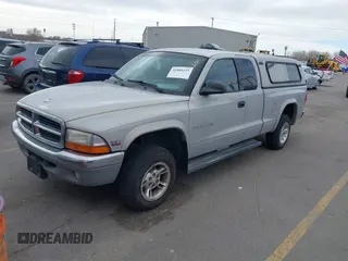 1999 Dodge Dakota SLT with VIN 1B7GG22YXXS255021, listed as a IAAI auction lot 41809325 with 204,352 mi miles and . Bid and sale history available at carsss.com. Image 2.