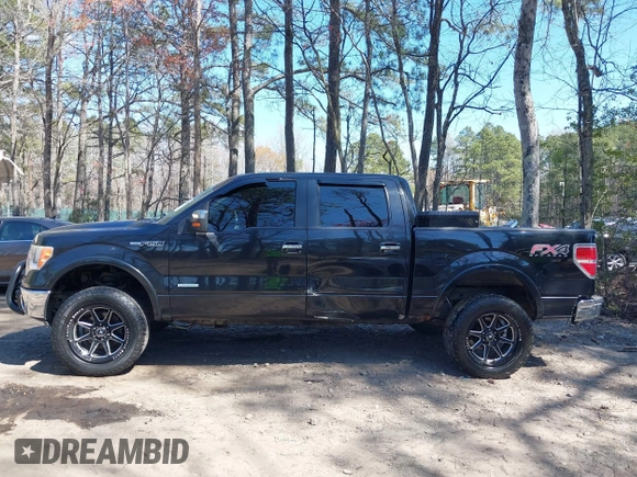 2011 Ford F-150 XLT with VIN 1FTFW1ET8BFA70797, listed as a IAAI auction lot 41909232 with 118,843 mi miles. Bid and sale history available at carsss.com. Image 14.