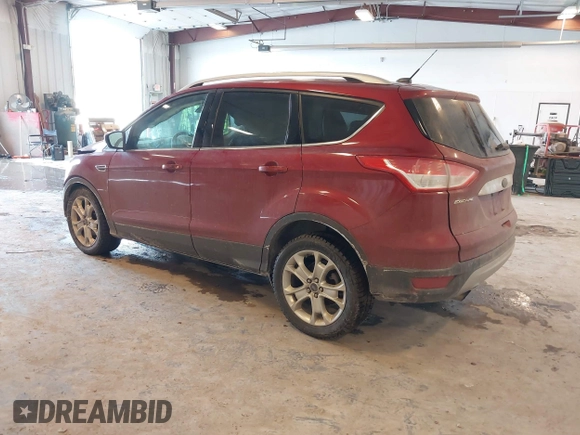 2014 Ford Escape Titanium with VIN 1FMCU0JX6EUC58726, listed as a IAAI auction lot 41656779 with 162,888 mi miles. Bid and sale history available at carsss.com. Image 3.