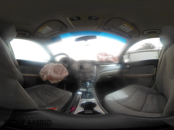 2012 Ford Fusion SE z VIN 3FAHP0HA3CR285217, wystawiony jako IAAI lot #41792353 z przebiegiem 190 916 mil mil oraz . Historia ofert i sprzedaży dostępna na DreamBid. Obrazek 18.