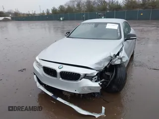 2014 BMW 4 Series 428i with VIN WBA3V5C51EJ968657, listed as a IAAI auction lot 41718019 with 111,083 mi miles and . Bid and sale history available at DreamBid. Image 2.