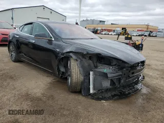 2017 Tesla Model S 100D with VIN 5YJSA1E21HF218273, listed as a Copart auction lot 55598075 with Not provided miles and Salvage title. Bid and sale history available at DreamBid. Image 4.