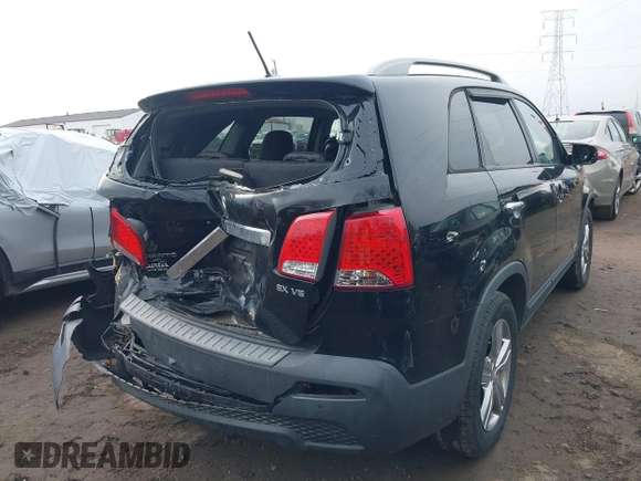2012 Kia Sorento EX with VIN 5XYKUDA21CG285102, listed as a IAAI auction lot 41749176 with 154,034 mi miles. Bid and sale history available at carsss.com. Image 4.