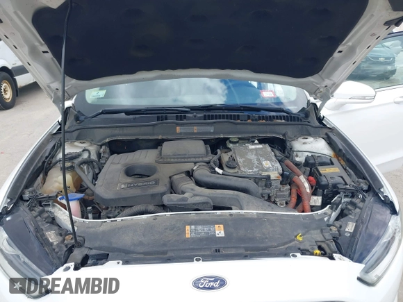 2013 Ford Fusion SE Hybrid with VIN 3FA6P0LUXDR328784, listed as a IAAI auction lot 42231399 with 169,462 mi miles and . Bid and sale history available at carsss.com. Image 10.