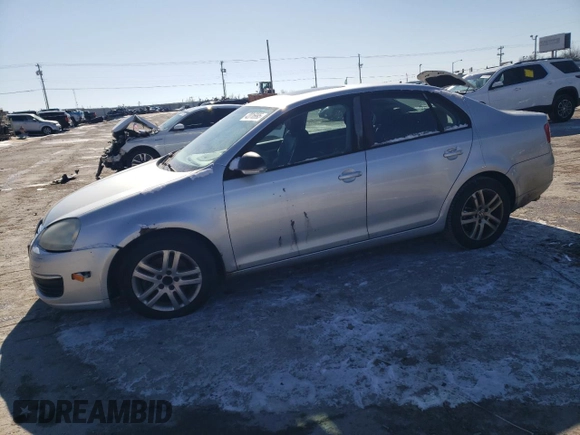 2007 Volkswagen Jetta z VIN 3VWHG71K27M111595, wystawiony jako Copart lot #42016995 z przebiegiem 155 565 mil mil oraz Czysty tytuł • Clean title. Historia ofert i sprzedaży dostępna na DreamBid. Obrazek 1.
