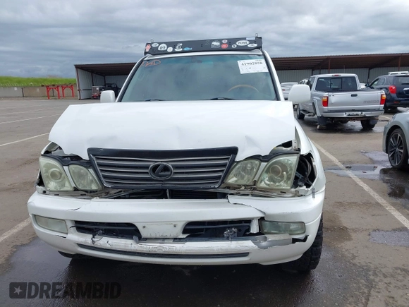 2004 Lexus LX 470 z VIN JTJHT00W043543915, wystawiony jako IAAI lot #41902858 z przebiegiem 110 454 mil mil oraz . Historia ofert i sprzedaży dostępna na DreamBid. Obrazek 13.