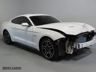 2021 Ford Mustang GT with VIN 1FA6P8CF1M5110879, listed as a Copart auction lot 53738305 with 61,243 mi miles and Salvage Title. Bid and sale history available at carsss.com. Image 1.