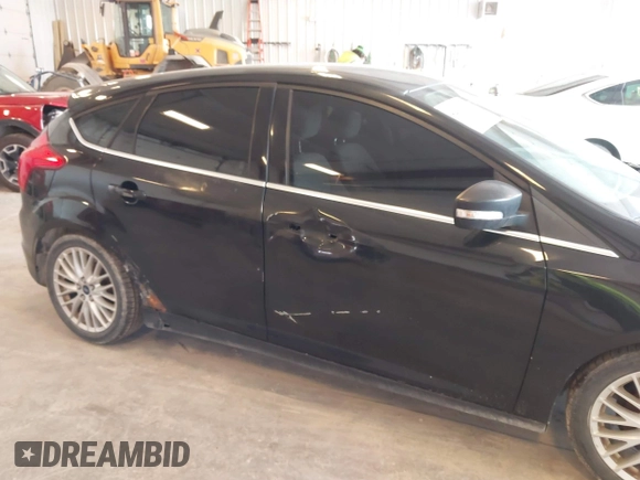 2012 Ford Focus SEL with VIN 1FAHP3M24CL331586, listed as a IAAI auction lot 42086129 with 193,060 mi miles. Bid and sale history available at carsss.com. Image 6.