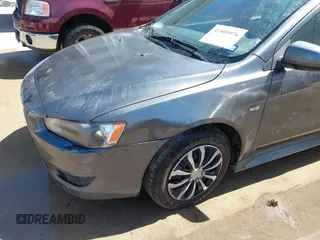 2010 Mitsubishi Lancer DE with VIN JA32U1FU1AU033241, listed as a IAAI auction lot 41805976 with 214,606 mi miles. Bid and sale history available at carsss.com. Image 6.