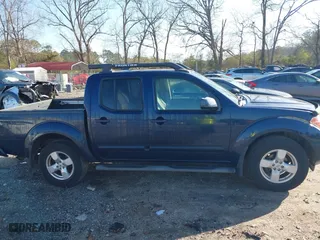 2006 Nissan Frontier LE with VIN 1N6AD07U26C469189, listed as a IAAI auction lot 41780595 with 146,000 mi miles. Bid and sale history available at carsss.com. Image 13.