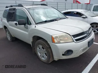 2007 Mitsubishi Endeavor LS z VIN 4A4MN21S17E074418, wystawiony jako IAAI lot #42221043 z przebiegiem 203 269 mil mil oraz . Historia ofert i sprzedaży dostępna na DreamBid. Obrazek 1.
