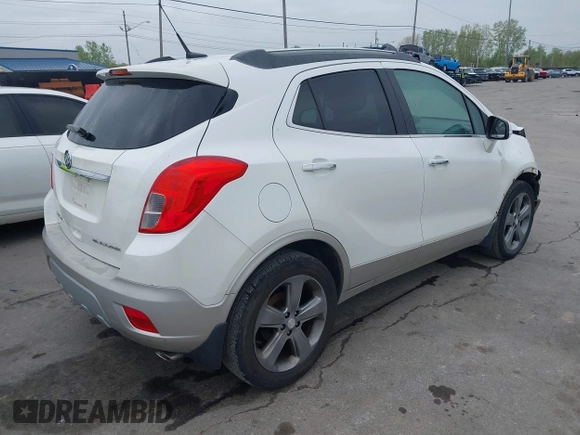 2014 Buick Encore Convenience with VIN KL4CJBSB3EB750986, listed as a IAAI auction lot 42195394 with 67,017 mi miles and . Bid and sale history available at DreamBid. Image 4.