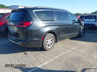 2022 Chrysler Pacifica Touring L with VIN 2C4RC1BG9NR117538, listed as a IAAI auction lot 42318518 with 103,311 mi miles and . Bid and sale history available at DreamBid. Image 4.