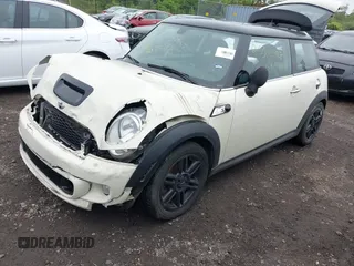 2013 MINI Hardtop S with VIN WMWSV3C51DT480022, listed as a IAAI auction lot 42398793 with Not provided miles and . Bid and sale history available at DreamBid. Image 2.