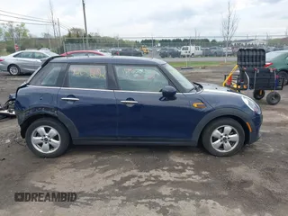 2015 MINI Hardtop 4 Door z VIN WMWXS5C54FT828442, wystawiony jako IAAI lot #42036692 z przebiegiem 88 224 mil mil oraz . Historia ofert i sprzedaży dostępna na DreamBid. Obrazek 14.