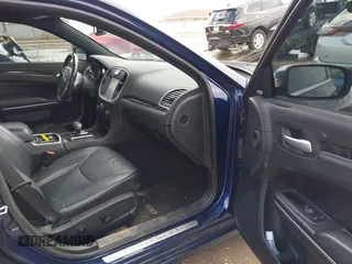 2014 Chrysler 300 C with VIN 2C3CCAKG2EH273209, listed as a IAAI auction lot 41955858 with 112,742 mi miles and . Bid and sale history available at carsss.com. Image 5.
