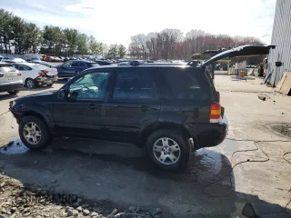 2004 Ford Escape Limited with VIN 1FMCU94154KB50085, listed as a Copart auction lot 50404455 with 180,249 mi miles and Salvage Title. Bid and sale history available at carsss.com. Image 2.