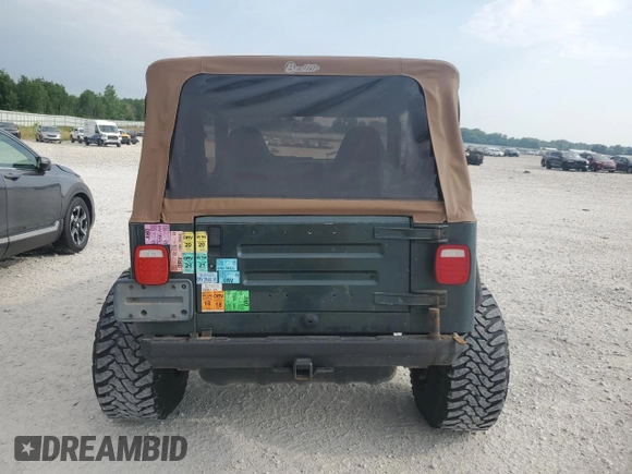 2002 Jeep Wrangler Sahara with VIN 1J4FA59S02P729015, listed as a Copart auction lot 63525745 with Not provided miles and Clean title. Bid and sale history available at DreamBid. Image 6.