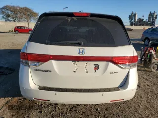 2016 Honda Odyssey Touring Elite with VIN 5FNRL5H93GB045542, listed as a Copart auction lot 46195125 with 157,897 mi miles and Salvage title. Bid and sale history available at DreamBid. Image 6.