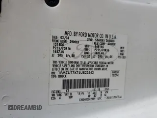2004 Ford Explorer Sport Trac XLS with VIN 1FMZU77K74UB23543, listed as a Copart auction lot 62859625 with 96,873 mi miles and Salvage title. Bid and sale history available at DreamBid. Image 12.