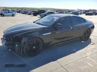 2016 BMW 6 Series 640i with VIN WBA6D0C58GG432405, listed as a Copart auction lot 81818864 with 100,700 mi miles and Salvage Title. Bid and sale history available at carsss.com. Image 1.